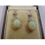 A pair of 18ct white gold opal and diamond drop earrings, approx total weight 5.7g