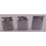 Three Ronson cigarette lighters of various shape and form