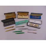 A quantity of pens and propelling pencils to include Sheaffer, Cross, Parker and Tiffany some in