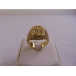 A 9ct yellow gold gentlemans signet ring, approx total weight 18.8g