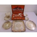A quantity of silver plate to include trays, dishes and a canteen of flatware