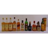 A quantity of whisky and whisky liqueurs to include Glenfiddich, Johhnie Walker and Bells (11)