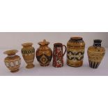 A quantity of Doulton Lambeth ceramics to include jugs and vases, marks to the bases (6)
