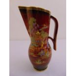 Crown Devon jug with scroll handle decorated to the sides in the Chinese style, marks to the base