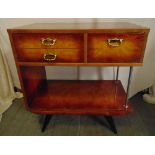 An Italian rectangular sideboard, three drawers with gilded metal scroll handles all on four