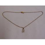 Diamond and gold pendant on a gold chain, approx total weight 5.7g