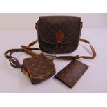 A Louis Vuitton satchel bag, a small utility bag and a wallet