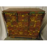 An Indian painted hardwood rectangular dowry chest, profusely carved throughout with panels of