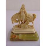 A fine ivory figurine of Lady Godiva and horse possibly Dieppe on shaped rectangular onyx base,