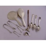 A quantity of silver to include four pairs of silver sugar tongs, three dessert spoons, a caddy