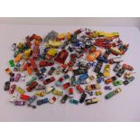 A quantity of playworn diecast cars and trucks to include Dinky, Matchbox and Corgi