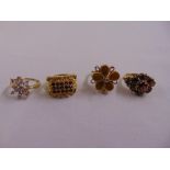 Four 9ct gold rings set with various stones, approx total weight 22.9g