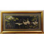 A rectangular framed and glazed Oriental embroidered silk of birds, signed bottom left, 42 x 95cm