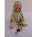 Armand Marseille bisque head doll and a miniature Victorian doll