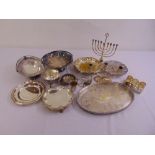 A quantity of silver plate to include trays, dishes and a Menorah