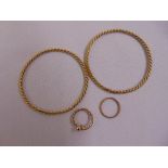 A quantity of 9ct gold jewellery to include two rope twist bangles, ring and a wedding ring,