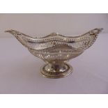 A Victorian silver oval fruit stand, bar pierced sides on raised oval base, London 1899 by