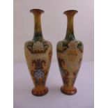 A pair of Royal Doulton vases tapering ovoid form with elongated necks and stylised flowers and