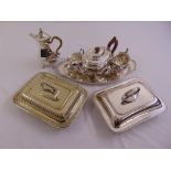 A quantity of silver plate to include a teaset, tray and entr‚e dishes and covers