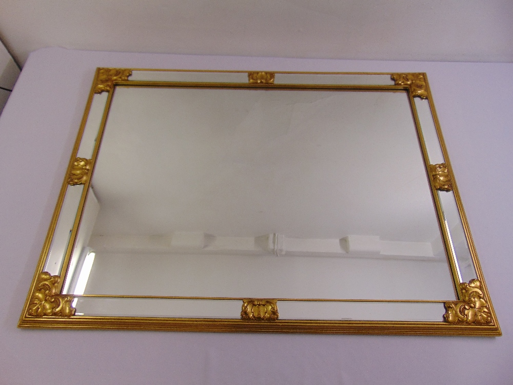 A rectangular wall mirror with gilded wooden frame, 89.5 x 118cm