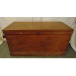 A mahogany rectangular blanket chest with hinged cover and cast iron swing handles to the sides,