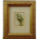 A framed and glazed painting on silk of a lady indistinctly signed bottom right, 12 x 8cm