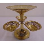 A silver plated epergne of circular section, scroll pierced with three detachable bowls on three