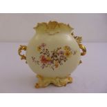 A Rudolstadt hand painted vase of bombe form decorated to the sides with floral sprays