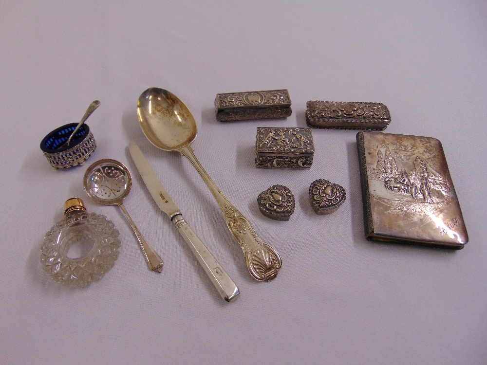 A quantity of hallmarked silver to include covered pill and ring boxes, a scent bottle and