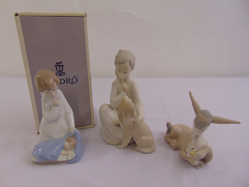 A quantity of Lladro figurines to include Angel with Baby 04635 in original packaging, Boy with