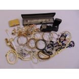 A quantity of costume jewellery to include rings, necklaces, bracelets, earrings and pendants