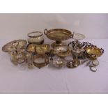 A quantity of silver plate to include a tray, dishes, a condiment set with glass bottles and