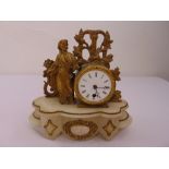 A French late 19th century gilt metal and marble mantle clock, white enamel dial, Roman numerals,