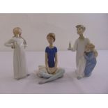 Three Lladro figurines of children, a ballerina, a girl and two children holding a candle