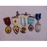 A quantity of Masonic jewels and two enamel brooches