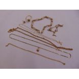 A quantity of 9ct gold jewellery to include bracelets, chains, a ring and an earring