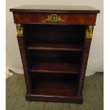 A mahogany rectangular display case with gilded metal mounts in the Empire style