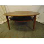 A Danish teak circular coffee table circa 1970s by F F France, label to the base