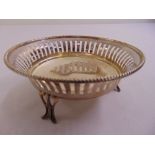 A silver circular bar pierced nut dish with beaded border, Birmingham 1904