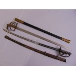 Two ceremonial military dress swords in original scabbards
