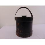 A late 19th century cylindrical leather box with metal liner, pull off cover and carrying handle