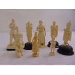 Eight 19th century carved ivory, bone and composition figurines