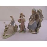 Three Lladro figurines of children, marks to the bases