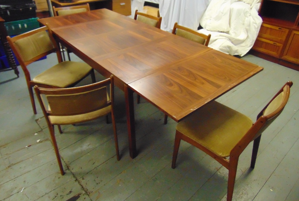 A late 20th century Danish rosewood rectangular dining table and six matching chairs (CITES