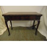 A mahogany rectangular Hepplewhite style games table on cabriole legs
