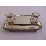 A rectangular silver inkstand with rope twist border, two detachable glass inkwells with silver