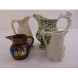 Four Victorian ceramic jugs of various form and decoration