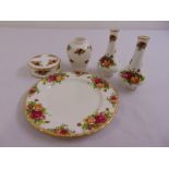 A quantity of Royal Albert Old Country Roses to include three vases, a covered dish and a plate