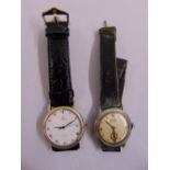 An Omega DeVille gentlemans quartz wristwatch and a Roamer 1940s vintage gentlemans wristwatch