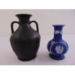 Wedgwood black basalt two handled baluster vase decorated with classical figures and a Wedgwood blue